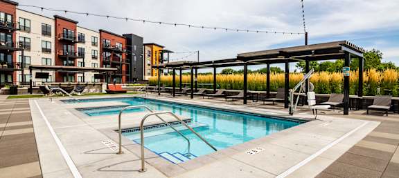 our apartments have a resort style pool with seating around it