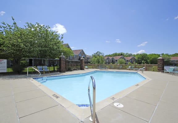 Refreshing Swimming Pool and Sundeck at Hampton Lakes Apartments in Walker, MI