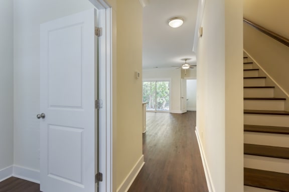 a look at the hallway from the front door of the home at Waverly Place, North Charleston, SC, 29418