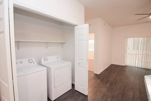 A laundry room with a washer and dryer.