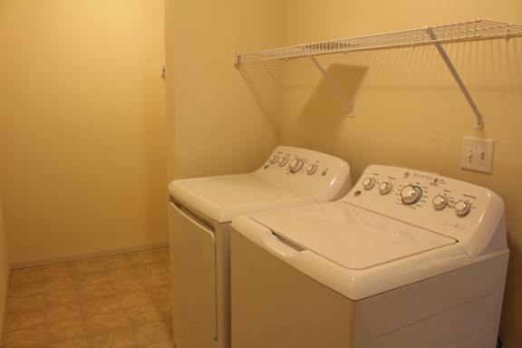 a washer and dryer in a laundry room