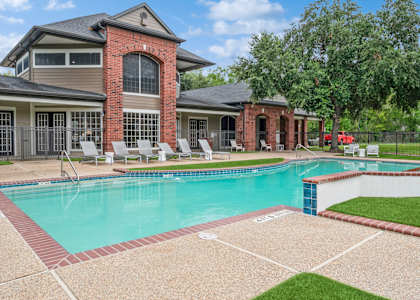 A house with a pool in the backyard.