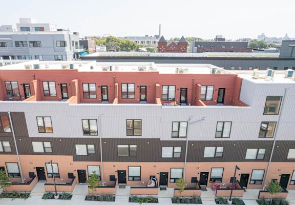a view of a building from the roof of another building