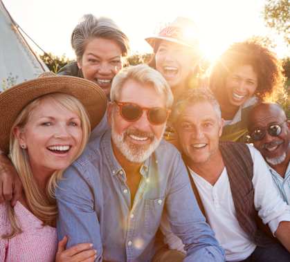 a group of people smiling at the camera