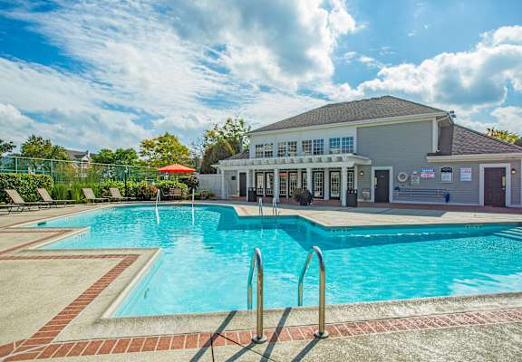 A large swimming pool in front of a building at Amhurst Lake Apartments, Waukegan, Illinois, 60085