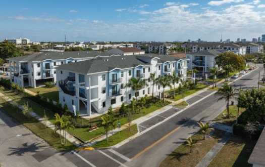 A photo of the Sora Apartments buildings from high above, showing the surrounding neighborhood.