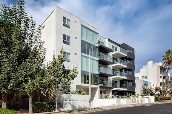 A modern building with the name "Reve" on it.