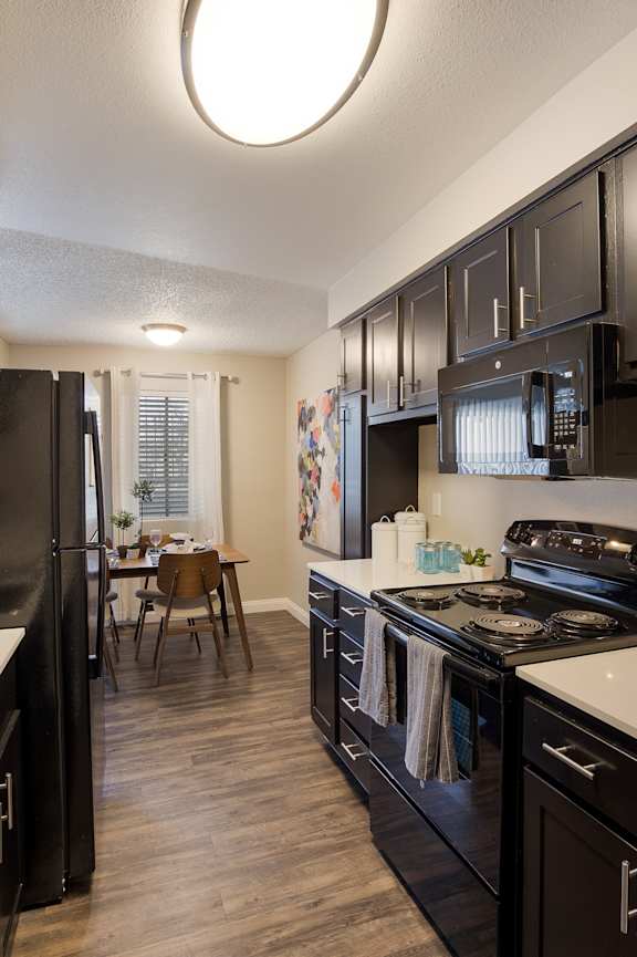 A swimming pool in front of apartment buildings at 2900 Lux Apartment Homes, Las Vegas, 89102