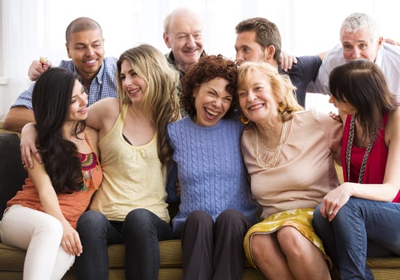 a group of people sitting on a couch