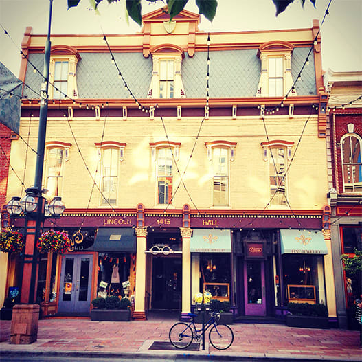 a bicycle parked in front of a building