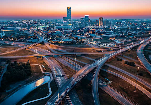 A cityscape with a complex network of highways and roads.
