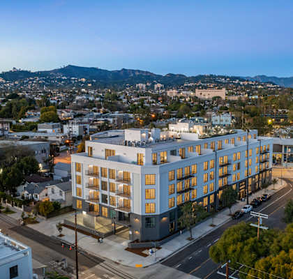 an aerial view of a building in the city