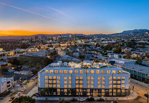 an aerial view of a building in the city