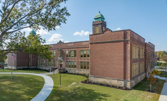 a brick building with a clock tower on top of it