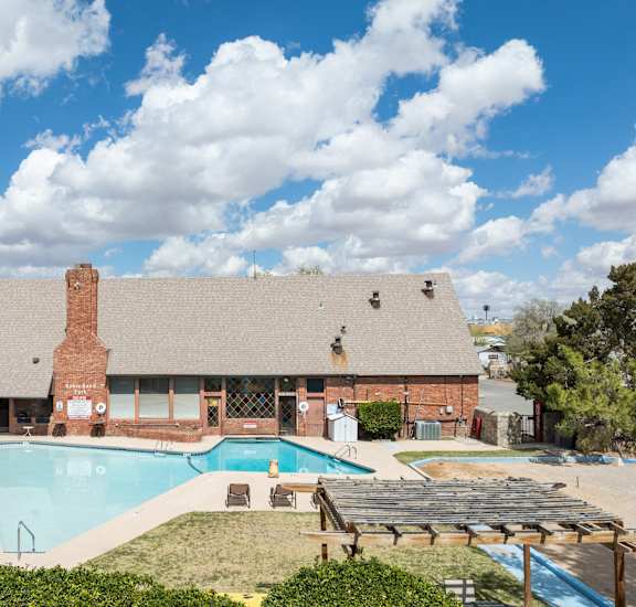 A house with a pool in the backyard.
