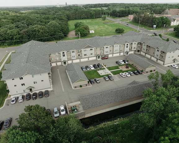 arial view of a building and parking lot