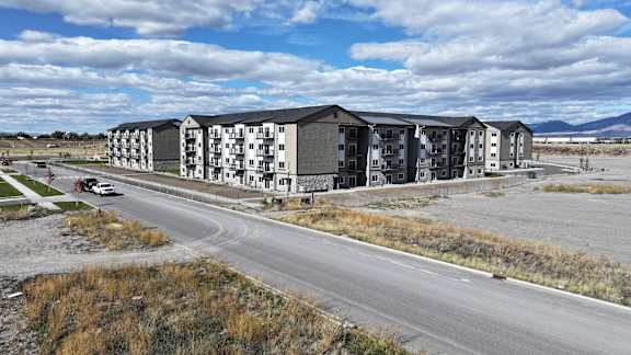 a building on the side of a road