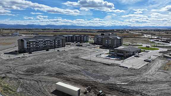 an aerial view of a building site in a city