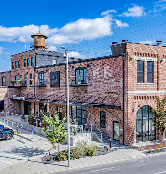 A brick building with a sign that says "ER" on it.