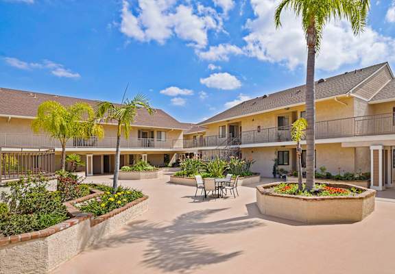 A sunny day at the courtyard of a residential building.