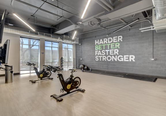 a fitness room with treadmills and other exercise equipment at The Vine on 8th, Nevada, 89101