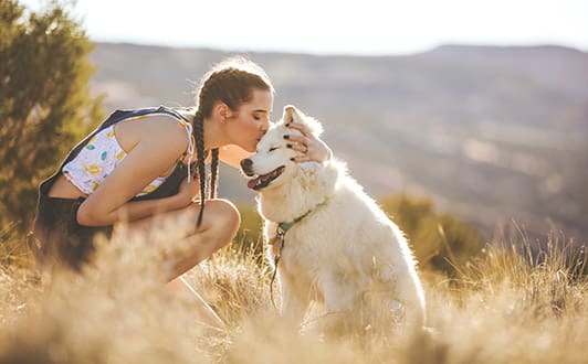 Woman With Her Dog at Brownstones at Palisade Park, Colorado
