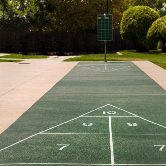 a basketball court on a tennis court