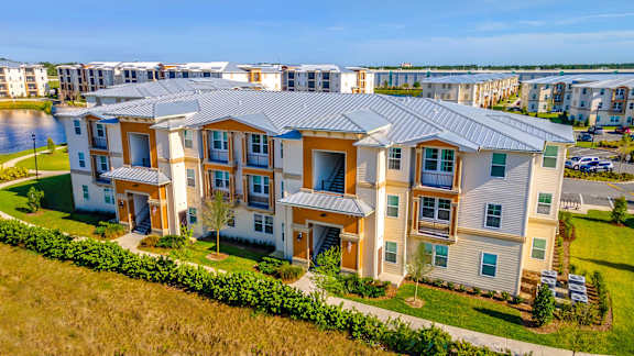 An advertisement for apartment homes with a limited-time app fee and a free month offer.