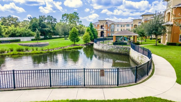 the pond at the preserve at green valley apartments in green valley ga