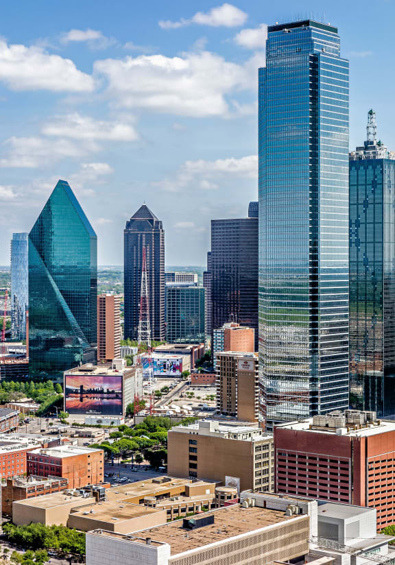 a view of the city skyline with skyscrapers