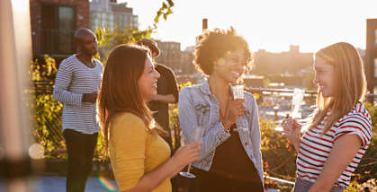 Friends Socializing at Refinery Row in Baltimore, MD 21224