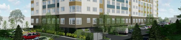 A modern multi-story apartment building with a parking lot in front.