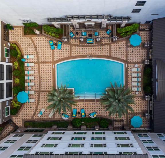 arial view of a swimming pool in between two buildings