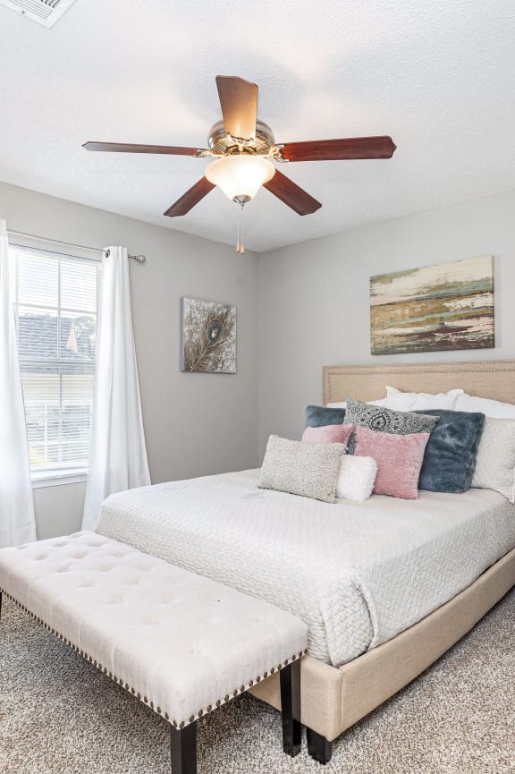 a home office with a desk and a window  at Laurelwood Apartment Homes, Laurel, Mississippi, 39440