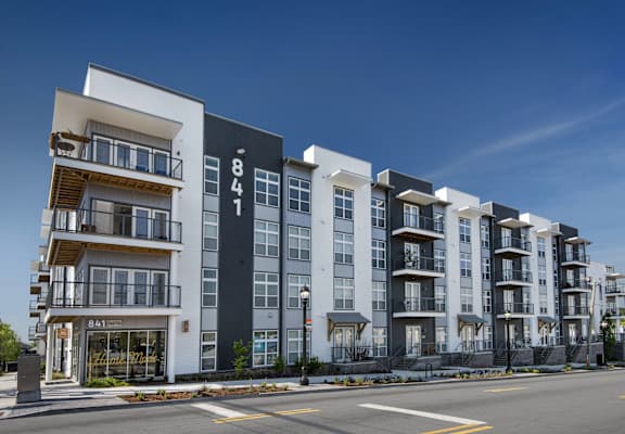 Apartment building 841 with balconies and doors are visible.
