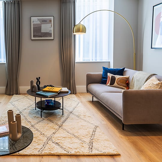a living room with a couch and a coffee table