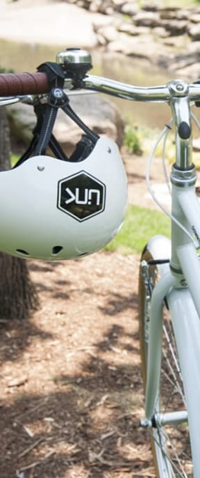 Bike Helmet Hangs from the Handlebars of a Bike at Link Apartments 4th Street in Winston-Salem, North Carolina