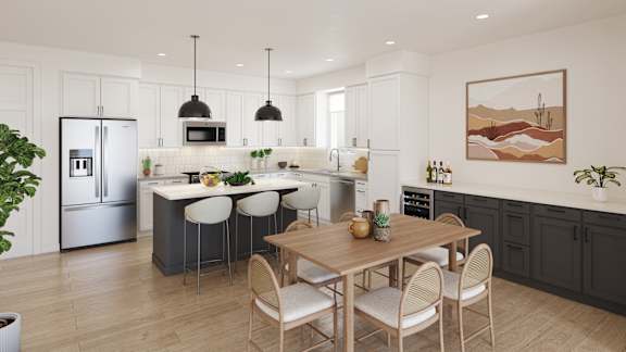 a kitchen with a table and chairs and a refrigerator
