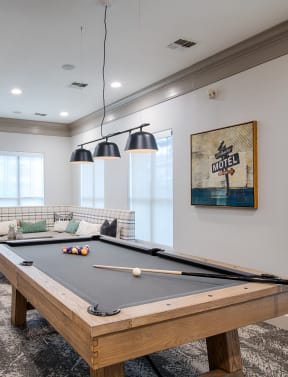 pool table and seating in club house