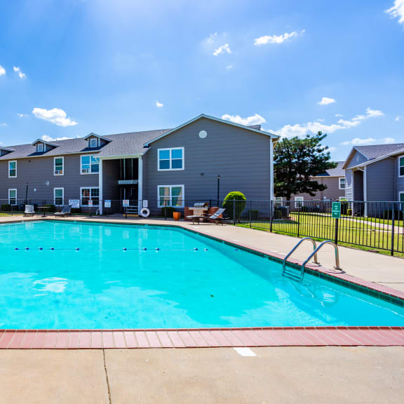 Swimming pool and side of building a  at Bennett Ridge Apartments, Oklahoma City, OK, 73132