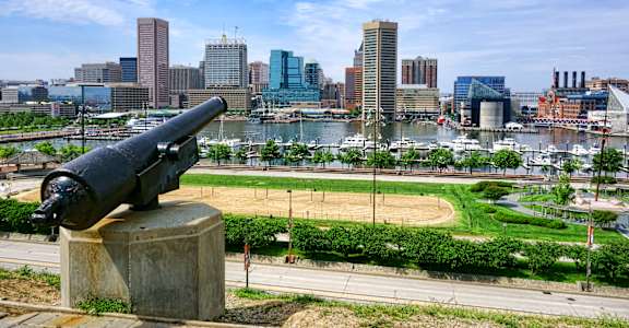 a cannon overlooking the baltimore inner harbor