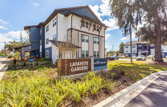 a large building with a sign that says lafayette gardens