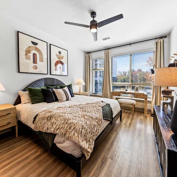 a bedroom with a bed and a ceiling fan  at South and Hollis, Charlotte, NC, 28209