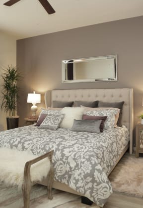 a bedroom with a bed and a mirror on the wall at Pima Canyon, Arizona, 85704