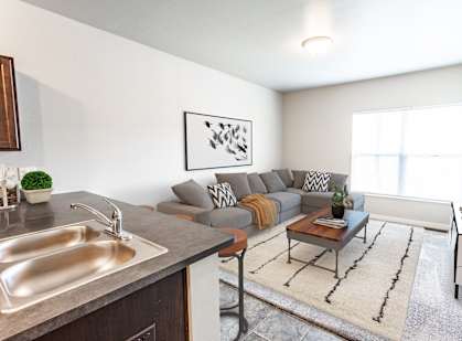a living room with a couch and a coffee table