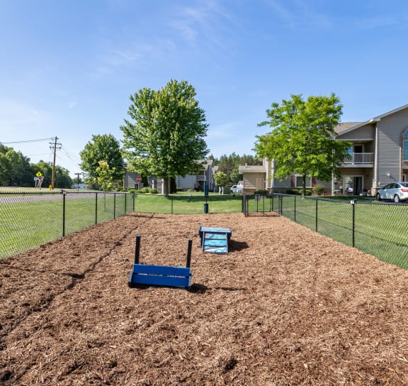 the preserve at ballantyne commons dog park with a fence and a blue sled