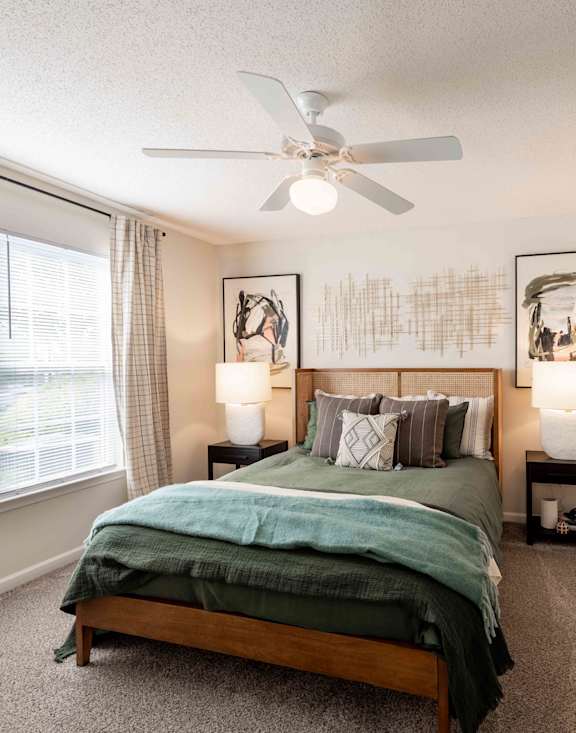 A well-equipped home gym with a variety of exercise machines and weights.