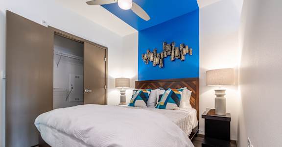 Bedroom with Closet at Rivet Apartments, Washington