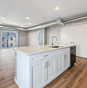 A room with a ceiling fan and a window with  at Siena Crossing Apartments, Ankeny, IA, 50223