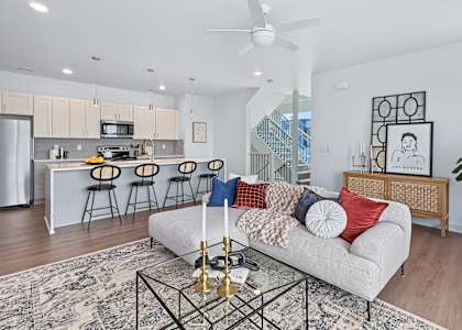Kitchen and Living room view at The Flats at West Glen Apartments, West Des Moines, IA